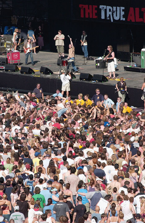 Femmes on stage with fans